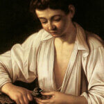 caravaggio ragazzo che monda un frutto